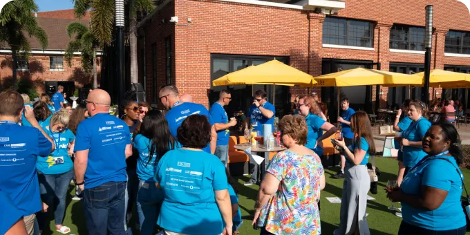 A group of people collaborating on a project together.