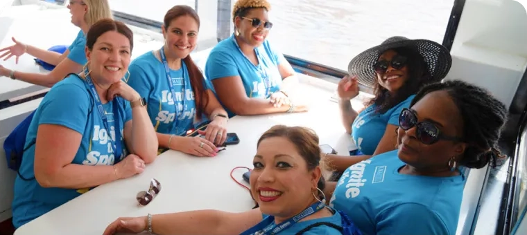 A group of people collaborating on a project together.